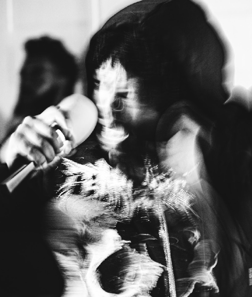 Zombieland — black and white motion portrait on the mic