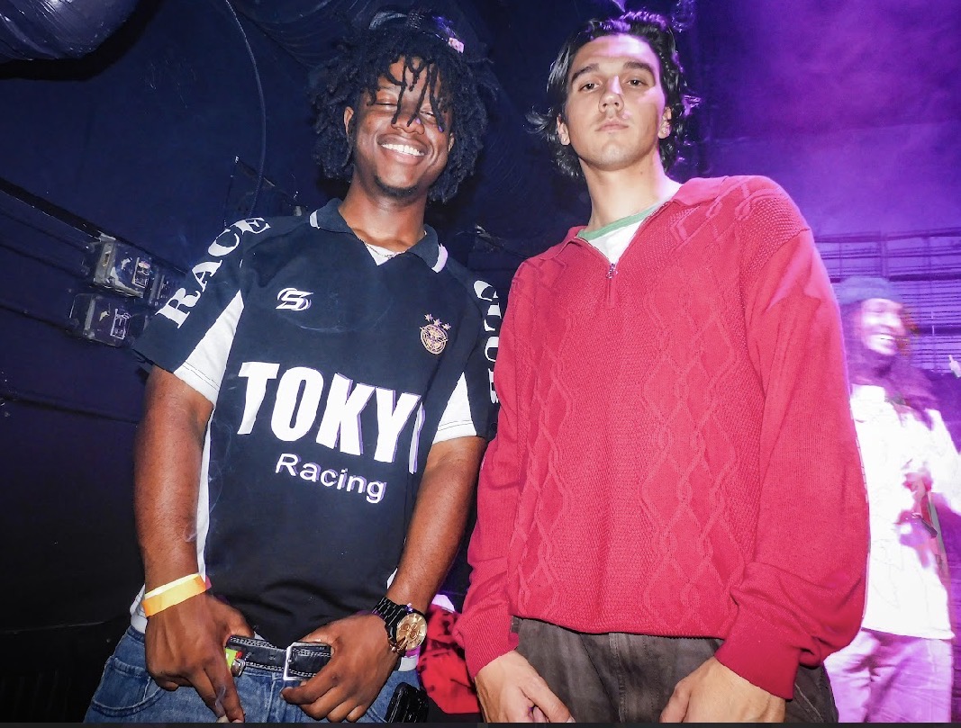 Zombieland — two friends at the show under purple stage light