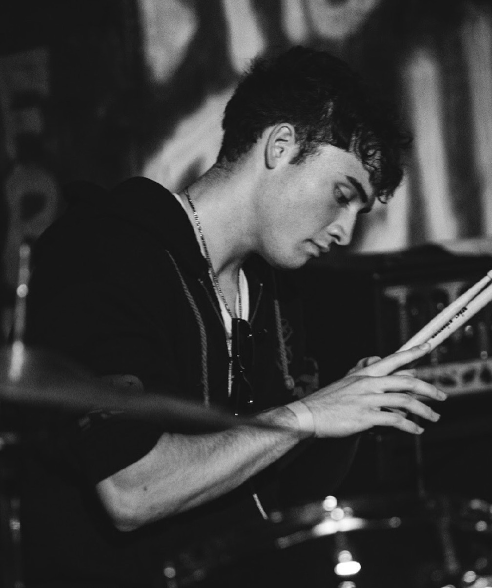 Zombieland — drummer locked in, black and white portrait