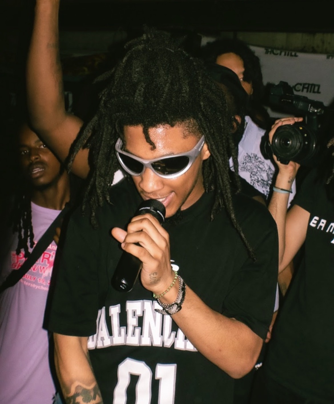 Wasteland — performer on the mic under the lights