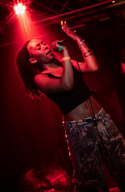 Halloween Riot — vocalist on stage in red light