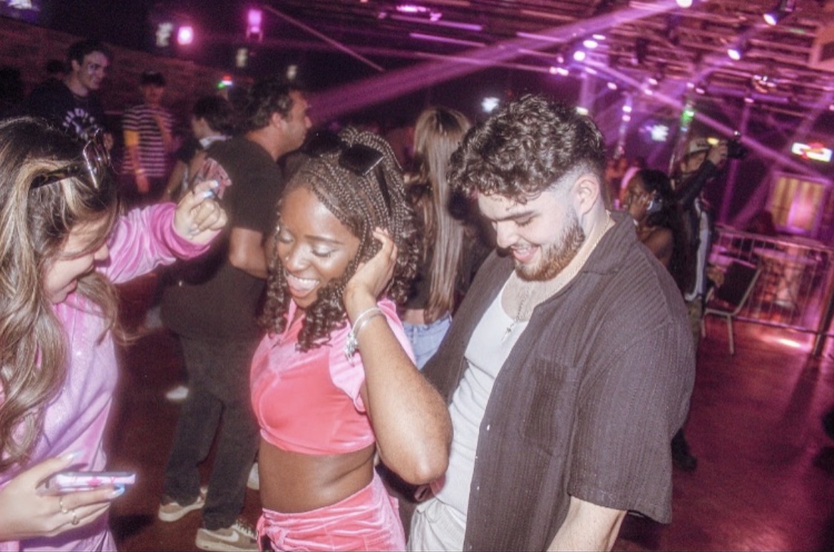 Zombieland — dancing on the floor in pink light
